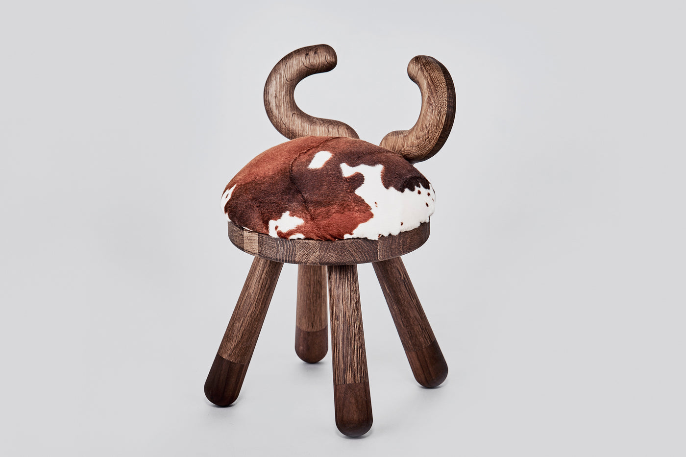 Chair COW, Featured in Louis Vuitton hotels and Fendi shops,