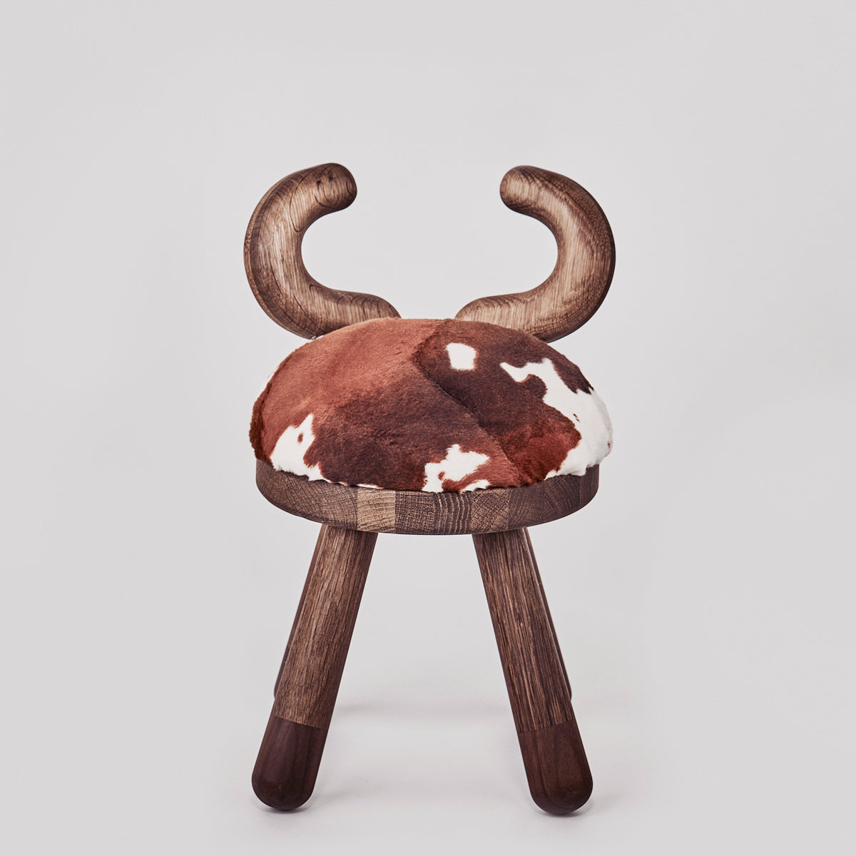 Chair COW, Featured in Louis Vuitton hotels and Fendi shops,